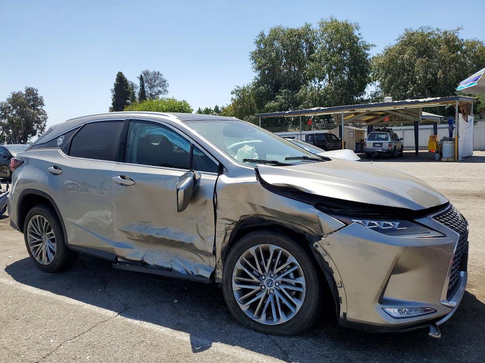 2021 Lexus Rx VIN 2T2JZMAA3MC189291 COPART salvage auction — SIDE, Ca - Salvage Certificate, sold $14,100 on 2026-07-02 (photo 4)