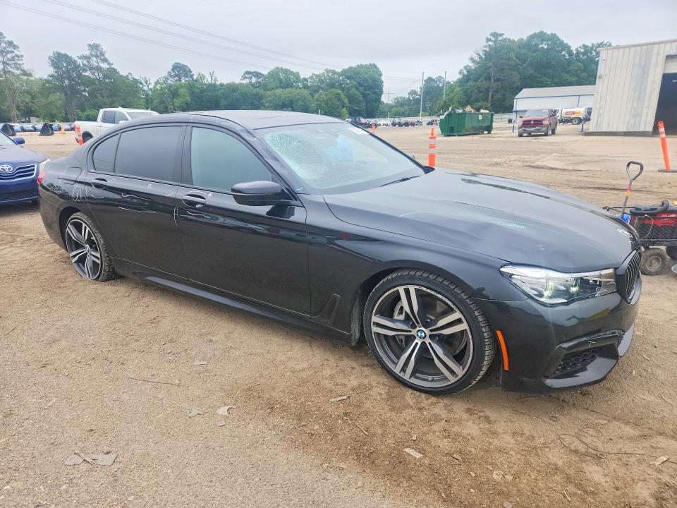 2018 BMW 7er VIN WBA7E2C57JG743313 COPART salvage auction — ROOF, Id - Salvage Certificate Of Title, sold $5,600 on 2026-07-17 (photo 4)