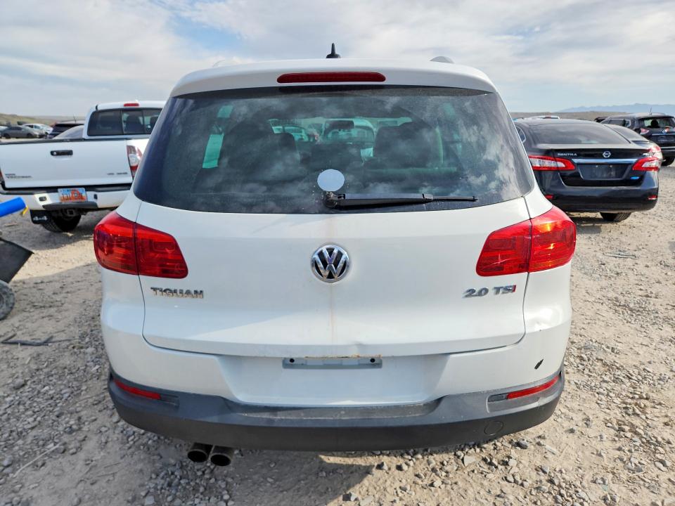 2013 Volkswagen Tiguan VIN WVGAV3AXXDW560464 COPART salvage auction — MINOR DENT/SCRATCHES, Mt - Certificate Of Title, sold $350 on 2026-07-31 (photo 6)