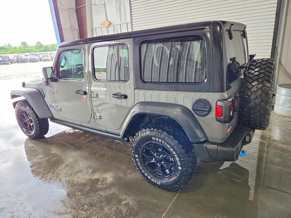 2023 Jeep Wrangler / VIN 1C4JJXN62PW605460 COPART salvage auction — MINOR DENT/SCRATCHES, Il - Certificate Of Title, sold $21,000 on 2026-07-02 (photo 2)