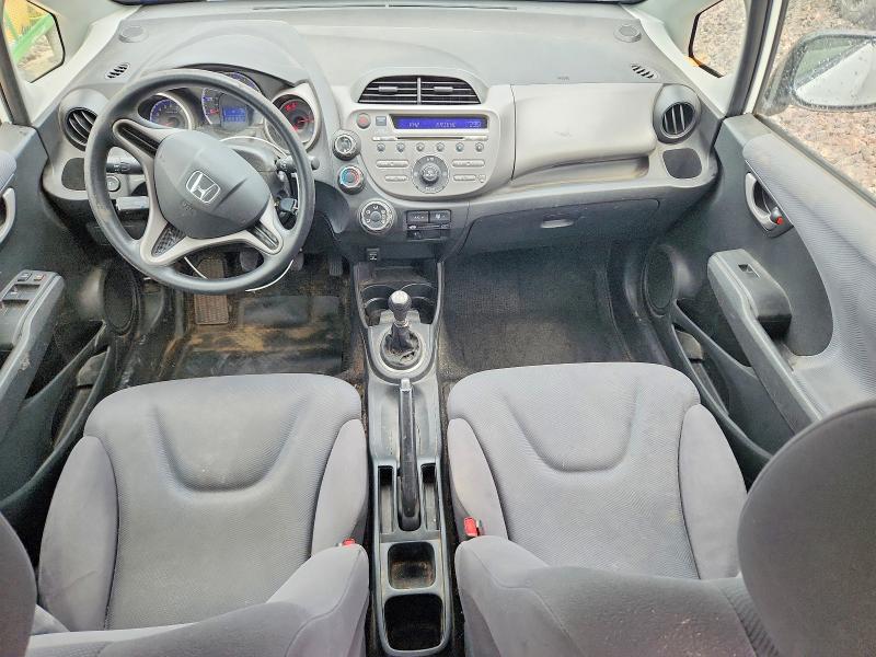 2010 Honda Fit VIN JHMGE8G26AC010455 COPART salvage auction — HAIL, Mo - Salvage Certificate Of Title, sold $3,100 on 2026-07-15 (photo 8)