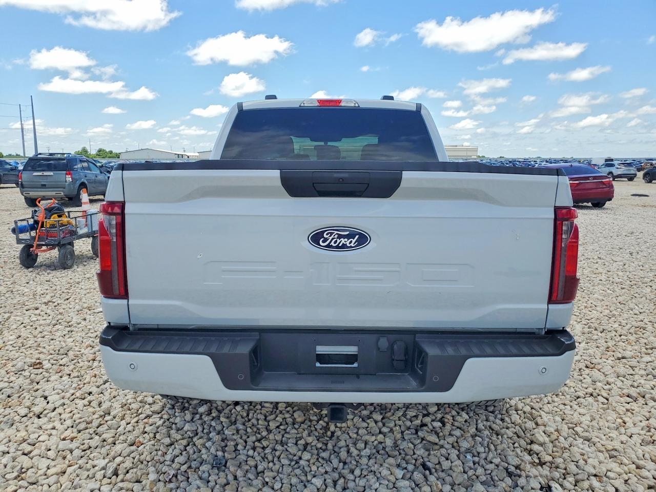 2025 Ford F-150 Lightning VIN 1FTEW2KPXSKD02011 COPART salvage auction — Front End, TX - SALVAGE VEHICLE TITLE, sold $13,100 on 2026-07-09 (photo 6)