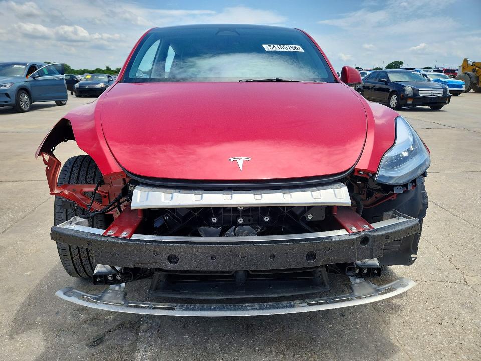 2023 Tesla VIN 7SAYGDEE8PA088690 COPART salvage auction — SIDE, Tx - Certificate Of Title, sold $13,700 on 2026-07-09 (photo 5)