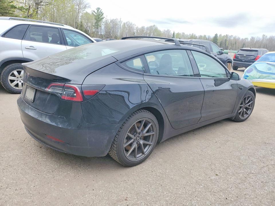 2021 Tesla Model 3 VIN 5YJ3E1EA6MF016944 COPART salvage auction — SIDE, On - Permit No Brand - Unfit, sold $7,200 on 2026-07-16 (photo 3)