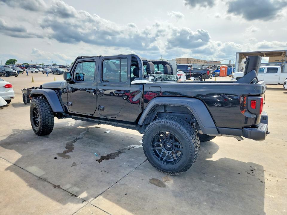 2023 Jeep Gladiator VIN 1C6HJTAG0PL584624 COPART salvage auction — ALL OVER, Tx - Certificate Of Title, sold $12,700 on 2026-07-30 (photo 2)