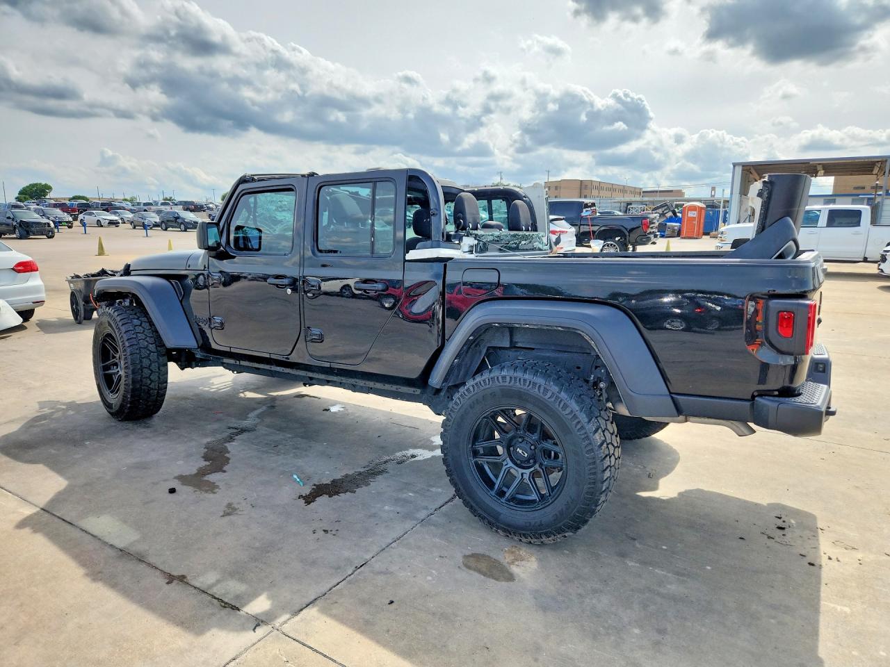 2023 Jeep Gladiator VIN 1C6HJTAG0PL584624 COPART salvage auction — All Over, TX - CERTIFICATE OF TITLE, sold $11,500 on 2026-07-08 (photo 2)