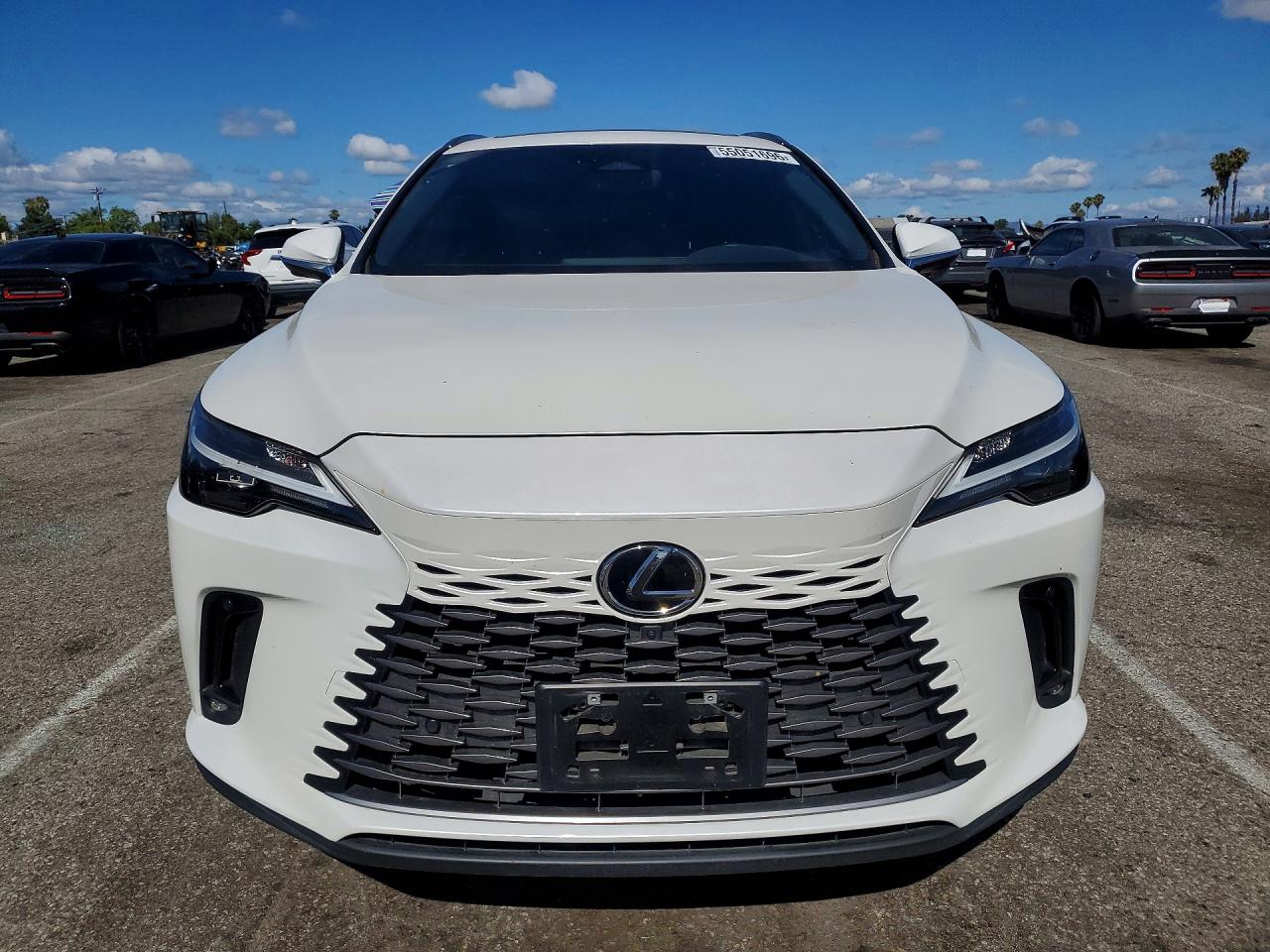 2024 Lexus RX 350 VIN JTJCHMAA7R2017221 COPART salvage auction — Side, CA - SALVAGE CERTIFICATE, sold $25,750 on 2026-07-10 (photo 5)