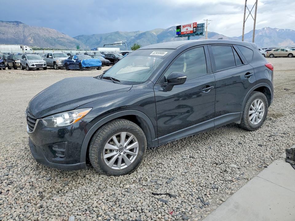 2016 Mazda VIN JM3KE2BY4G0866102 COPART salvage auction — SIDE, Ut - Salvage Certificate, sold $2,200 on 2026-07-27 (photo 1)