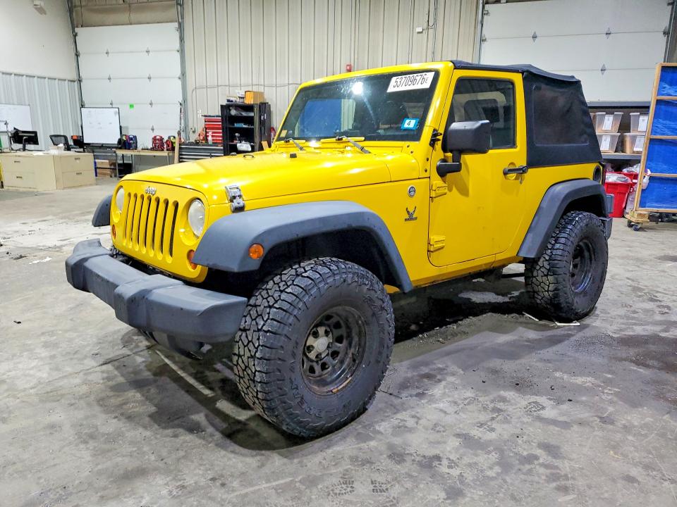 2009 Jeep Wrangler / VIN 1J4FA24129L741679 COPART salvage auction — SIDE, NH - CERT OF TITLE-SALVAGE, sold $925 on 2026-07-02 (photo 1)