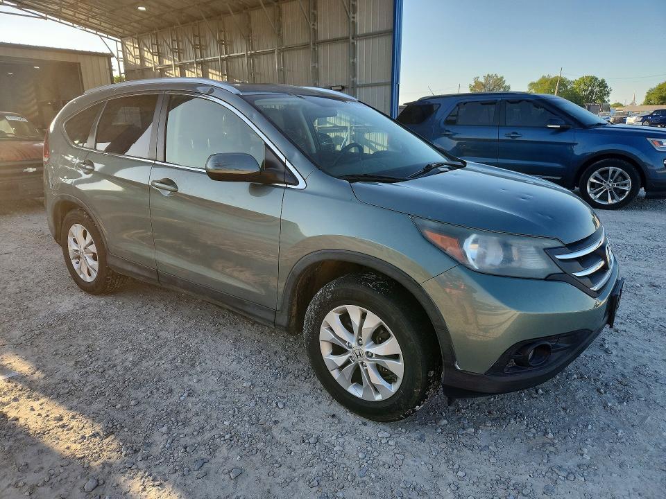 2012 Honda VIN JHLRM4H77CC012978 COPART salvage auction — HAIL, Salvage Title, sold $2,000 on 2026-07-21 (photo 4)