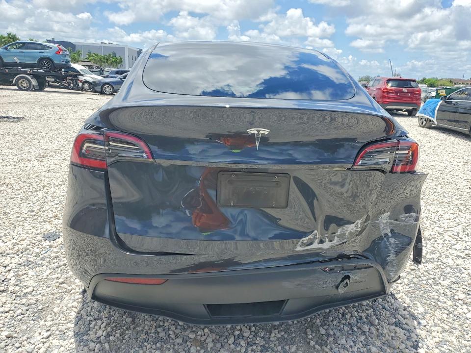 2024 Tesla VIN 7SAYGDED1RF034256 COPART salvage auction — REAR END, Fl - Cert Of Title Slvg Rebuildable, sold $6,000 on 2026-07-28 (photo 6)