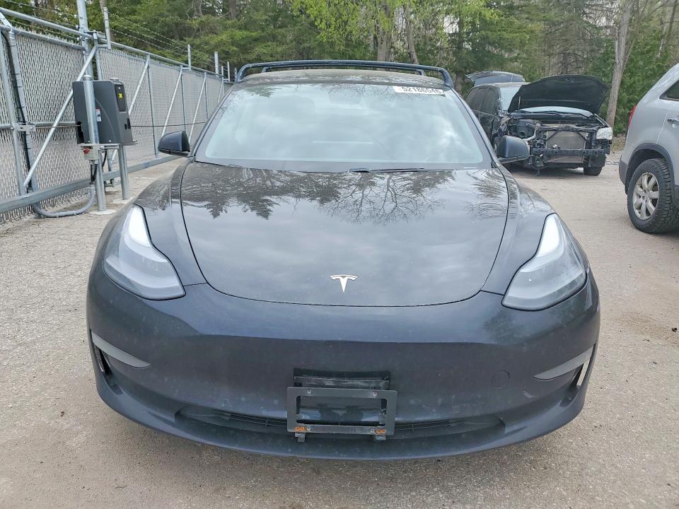 2021 Tesla Model 3 VIN 5YJ3E1EA6MF016944 COPART salvage auction — SIDE, On - Permit No Brand - Unfit, sold $7,200 on 2026-07-16 (photo 5)