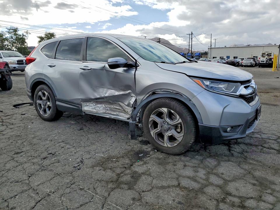 2018 Honda Cr-v VIN 7FARW1H8XJE050272 COPART salvage auction — SIDE, Ca - Salvage Certificate, sold $6,100 on 2026-07-16 (photo 4)
