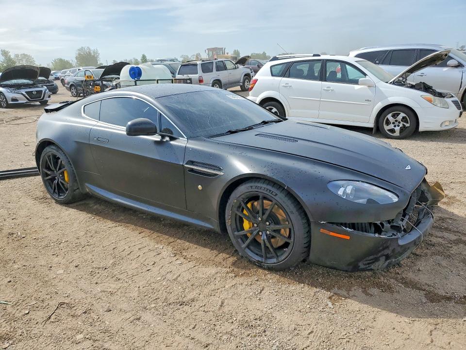 2012 Aston martin VIN SCFEBBAK3CGC16050 COPART salvage auction — REAR END, IL - SALVAGE CERTIFICATE, sold $16,600 on 2026-07-09 (photo 4)