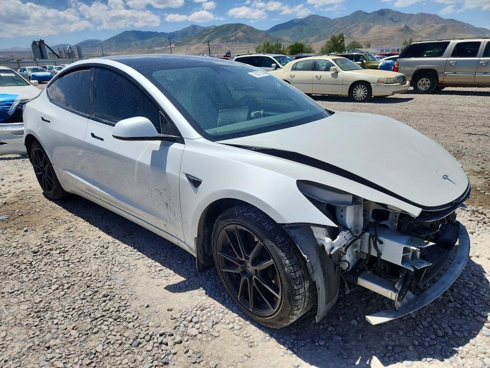 2021 Tesla Model 3 VIN 5YJ3E1EC3MF059669 COPART salvage auction — REAR END, UT - SALVAGE CERTIFICATE, sold $7,700 on 2026-07-24 (photo 4)