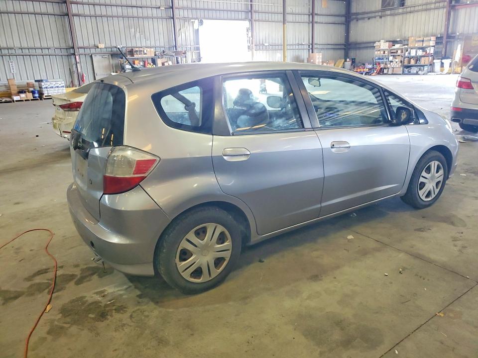 2010 Honda Fit VIN JHMGE8H27AS012865 COPART salvage auction — FRONT END, Fl - Cert Of Title Slvg Rebuildable, sold $775 on 2026-07-08 (photo 3)