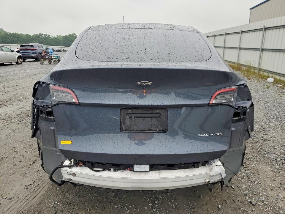 2022 Tesla Model y VIN 7SAYGDEE1NA015450 COPART salvage auction — REAR END, Nc - Salvage Certificate Of Title, sold $4,550 on 2026-07-29 (photo 6)