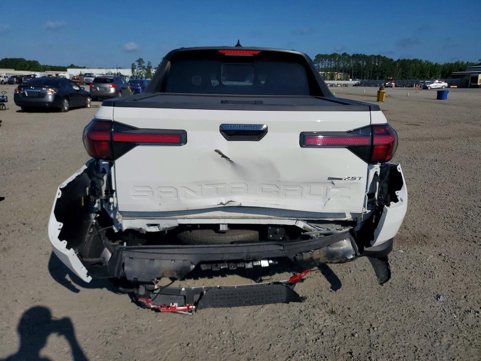 2025 Hyundai Santa cruz VIN 5NTJEDDF9SH143791 COPART salvage auction — REAR END, Nc - Salvage Certificate Of Title, sold $12,200 on 2026-07-20 (photo 6)