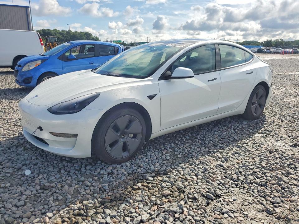 2023 Tesla Model 3 VIN 5YJ3E1EA4PF410737 COPART salvage auction — REAR END, Fl - Cert Of Title Slvg Rebuildable, sold $9,300 on 2026-07-13 (photo 1)