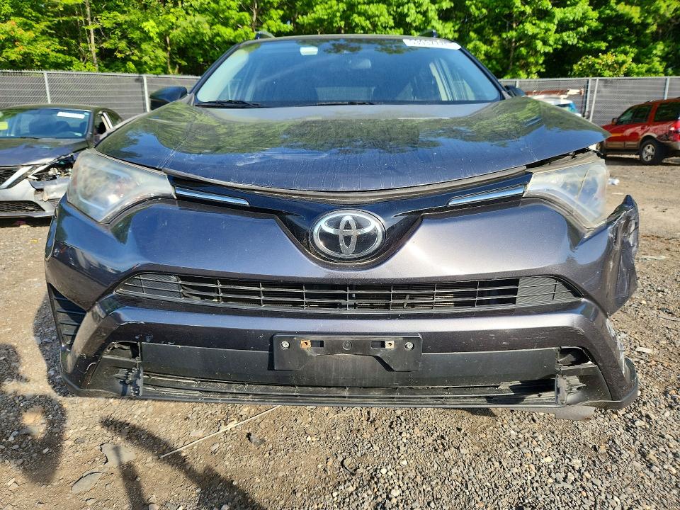 2017 Toyota Rav 4 VIN JTMZFREV7HJ711540 COPART salvage auction — SIDE, Md - Cert Of Salvage > 75% Damage, sold $3,950 on 2026-07-17 (photo 5)