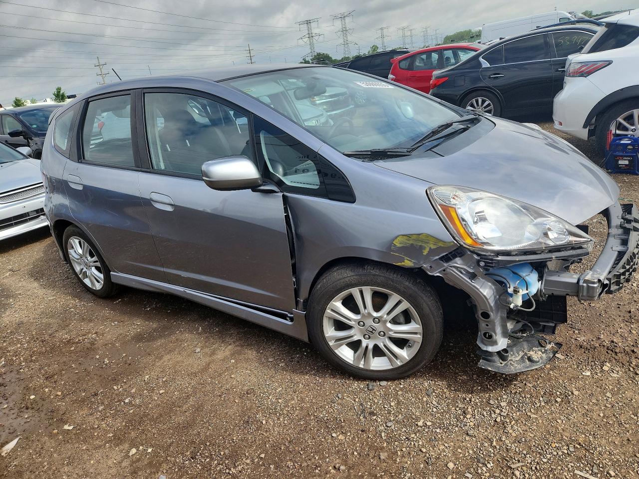 2009 Honda Fit VIN JHMGE88429S012091 COPART salvage auction — All Over, IL - SALVAGE CERTIFICATE, sold $875 on 2026-06-30 (photo 4)