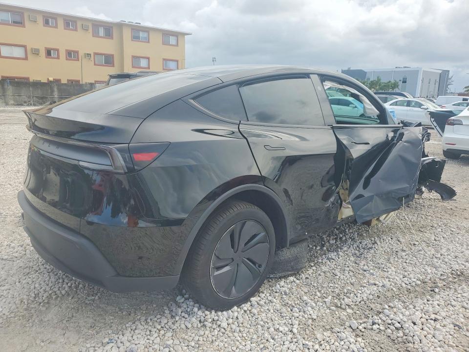 2026 Tesla Model y VIN 7SAYGDED0TA655752 COPART salvage auction — SIDE, Fl - Certificate Of Destruction, sold $6,600 on 2026-07-28 (photo 3)