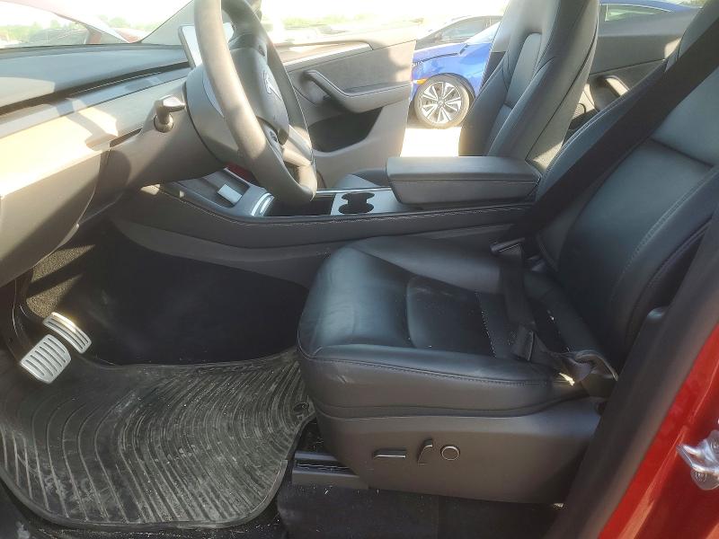 2024 Tesla Model y VIN 7SAYGDEF7RA313080 COPART salvage auction — SIDE, Tx - Salvage Vehicle Title, sold $11,600 on 2026-07-13 (photo 7)