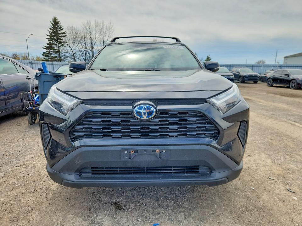 2023 Toyota Rav4 hybrid VIN 2T3RWRFV9PW158954 COPART salvage auction — SIDE, On - Permit No Brand - Unfit, sold $17,400 on 2026-07-02 (photo 5)