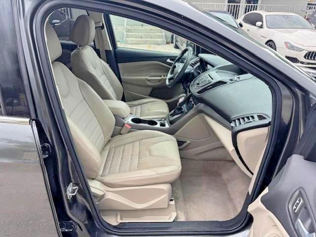 2016 Ford Escape VIN 1FMCU0GX4GUC35892 COPART salvage auction — MINOR DENT/SCRATCHES, Fl - Certificate Of Destruction (P), sold $3,900 on 2026-07-09 (photo 7)