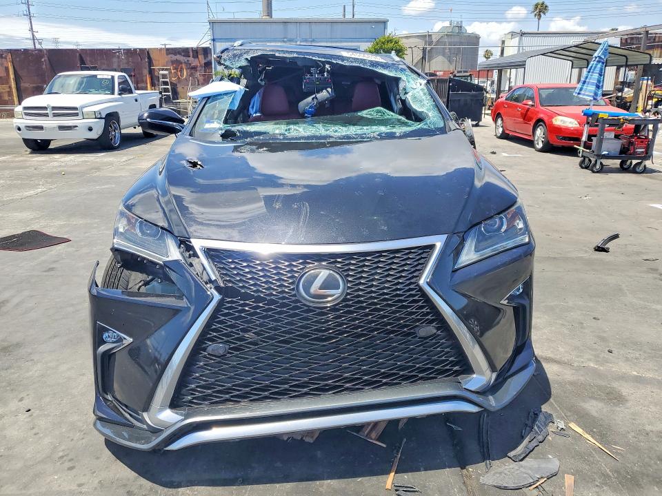 2018 Lexus Rx VIN 2T2BZMCA4JC157219 COPART salvage auction — ROLLOVER, Ca - Salvage Certificate, sold $4,500 on 2026-07-02 (photo 5)