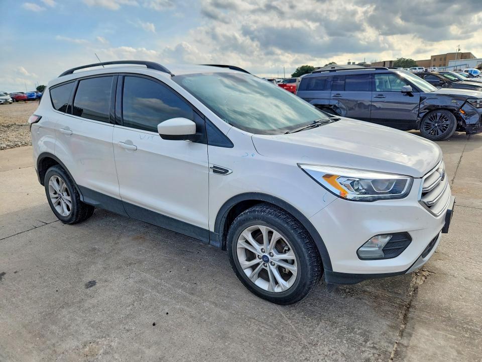 2018 Ford Escape VIN 1FMCU0HD2JUD20516 COPART salvage auction — HAIL, Tx - Certificate Of Title, sold $5,000 on 2026-07-09 (photo 4)
