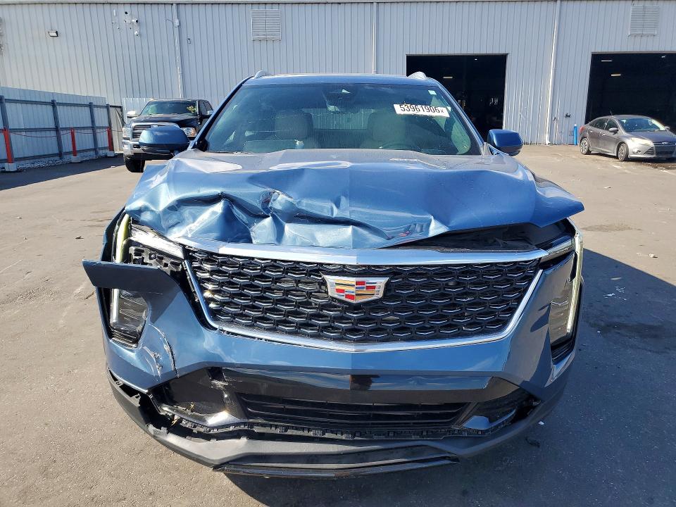 2024 Cadillac Xt4 VIN 1GYFZDR40RF159716 COPART salvage auction — FRONT END, Fl - Certificate Of Destruction, sold $8,200 on 2026-07-20 (photo 5)