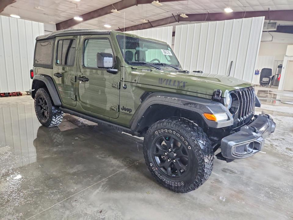 2021 Jeep Wrangler unlimited VIN 1C4HJXDN2MW744605 COPART salvage auction — NORMAL WEAR, IL - CERTIFICATE OF TITLE, sold $21,500 on 2026-07-16 (photo 4)