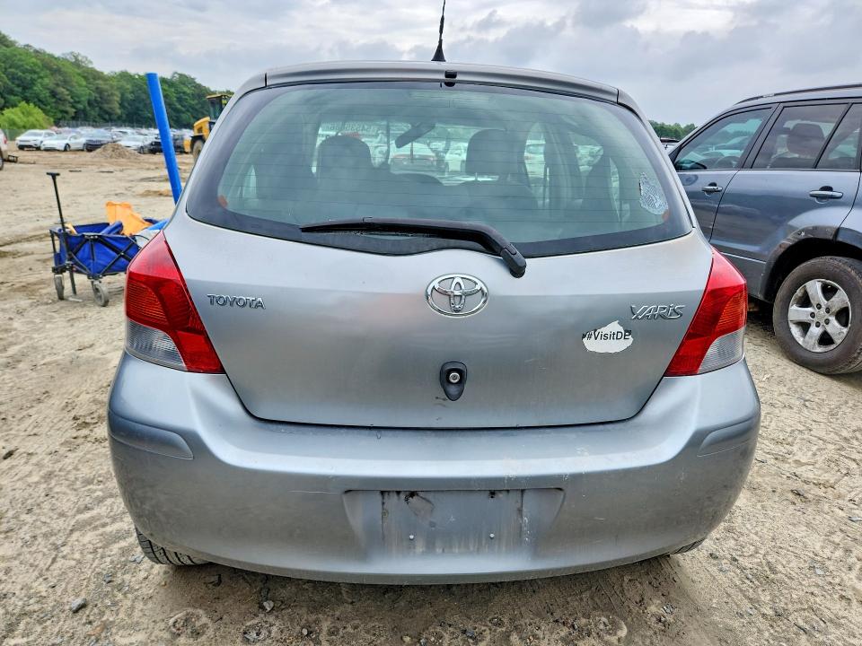 2011 Toyota Yaris VIN JTDKT4K35B5327353 COPART salvage auction — FRONT END, Md - Cert Of Salvage > 75% Damage, sold $625 on 2026-07-14 (photo 6)