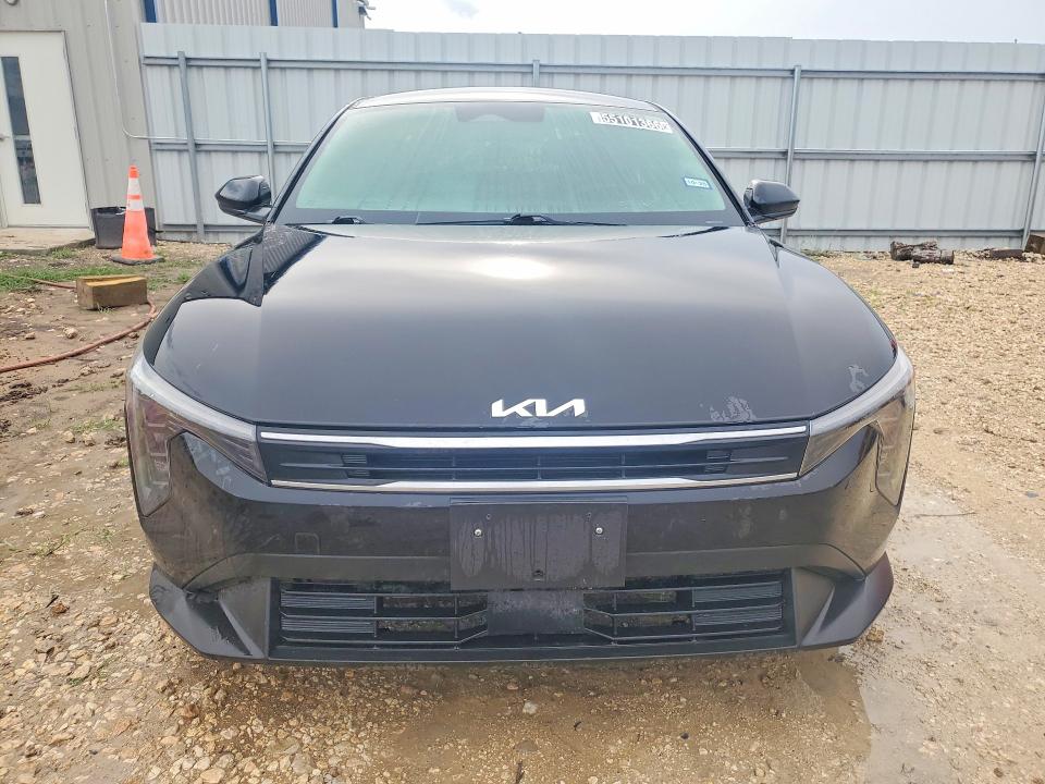 2025 Kia K4 VIN 3KPFT4DE1SE053542 COPART salvage auction — WATER/FLOOD, Tx - Salvage Title-Flood Damage, sold $4,350 on 2026-07-09 (photo 5)