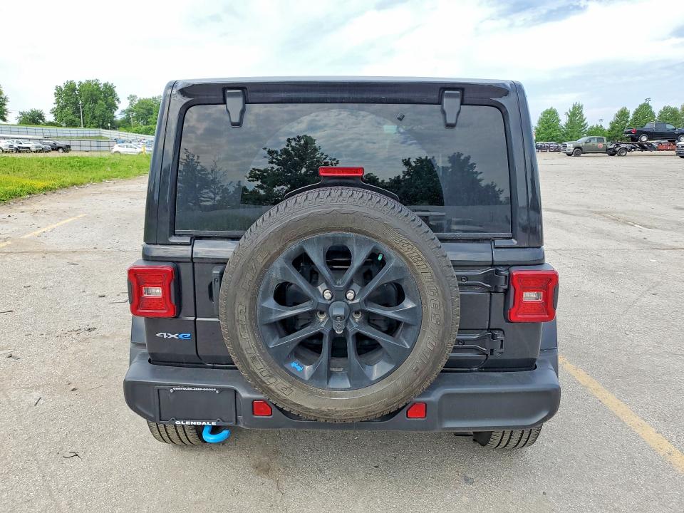 2023 Jeep Wrangler / VIN 1C4JJXP64PW513537 COPART salvage auction — MINOR DENT/SCRATCHES, Mo - Certificate Of Title, sold $21,000 on 2026-07-02 (photo 6)