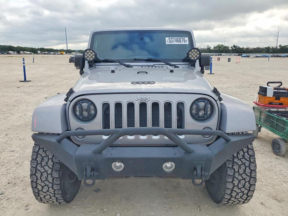 2016 Jeep Wrangler / VIN 1C4BJWEG4GL155500 COPART salvage auction — SIDE, Tx - Salvage Vehicle Title, sold $9,800 on 2026-07-09 (photo 5)