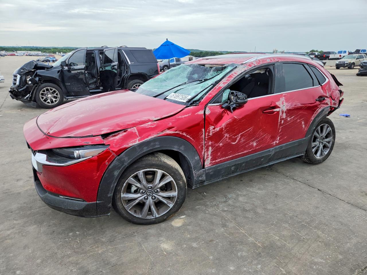 2025 Mazda CX-30 VIN 3MVDMBDM8SM795456 COPART salvage auction — Rollover, TX - SALVAGE VEHICLE TITLE (P), sold $1,250 on 2026-07-09 (photo 1)