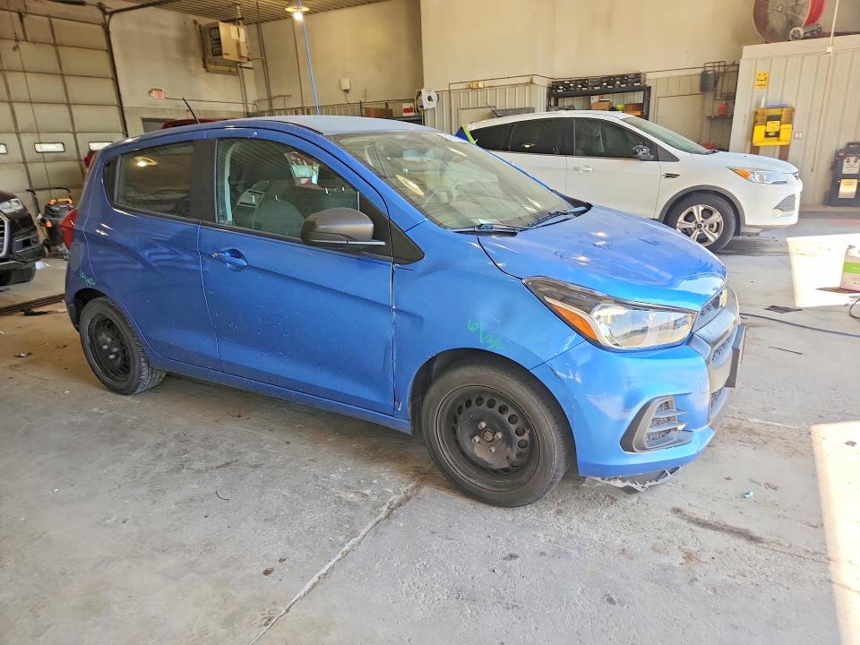 2016 Chevrolet VIN KL8CB6SA7GC539197 COPART salvage auction — SIDE, Id - Salvage Certificate Of Title, sold $300 on 2026-07-14 (photo 4)