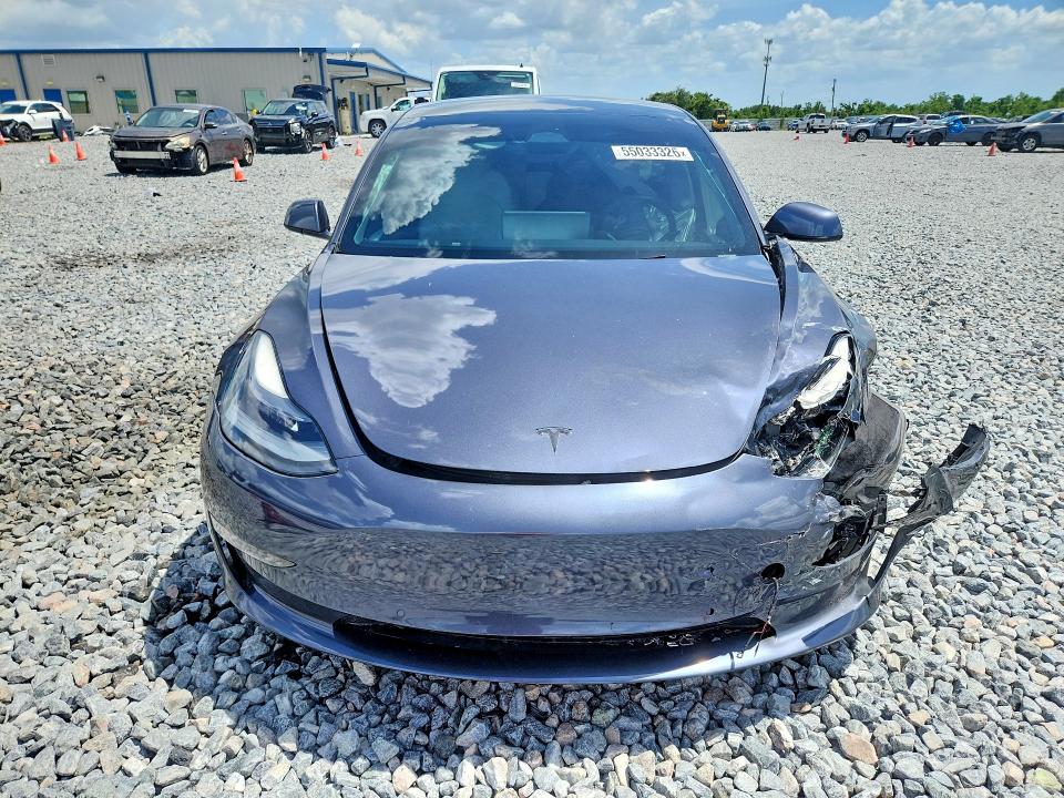 2021 Tesla Model 3 VIN 5YJ3E1EC4MF988608 COPART salvage auction — FRONT END, Fl - Cert Of Ttl-Rebuilt&Slvg Rbld, sold $7,000 on 2026-07-07 (photo 5)