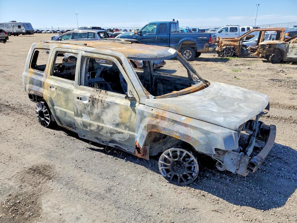 2014 Jeep Patriot VIN 1C4NJRAB0ED518973 COPART salvage auction — BURN, Ab - Bos - Nonrepairable, sold $50 on 2026-07-09 (photo 4)