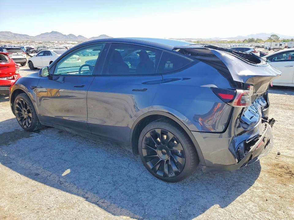 2023 Tesla Model y VIN 7SAYGAEE6PF700385 COPART salvage auction — REAR END, Ut - Salvage Certificate, sold $9,400 on 2026-08-27 (photo 2)