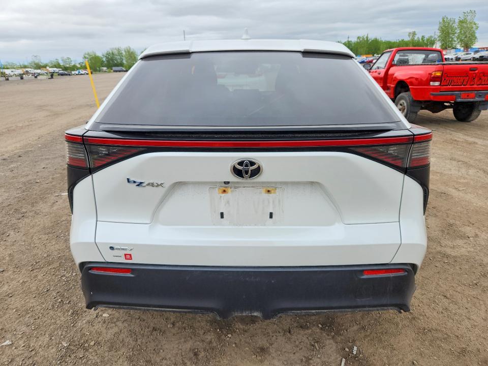 2024 Toyota Bz4x VIN JTMAAAAA5RA046042 COPART salvage auction — FRONT END, Qc - Gravement Accidente, sold $150 on 2026-07-21 (photo 6)