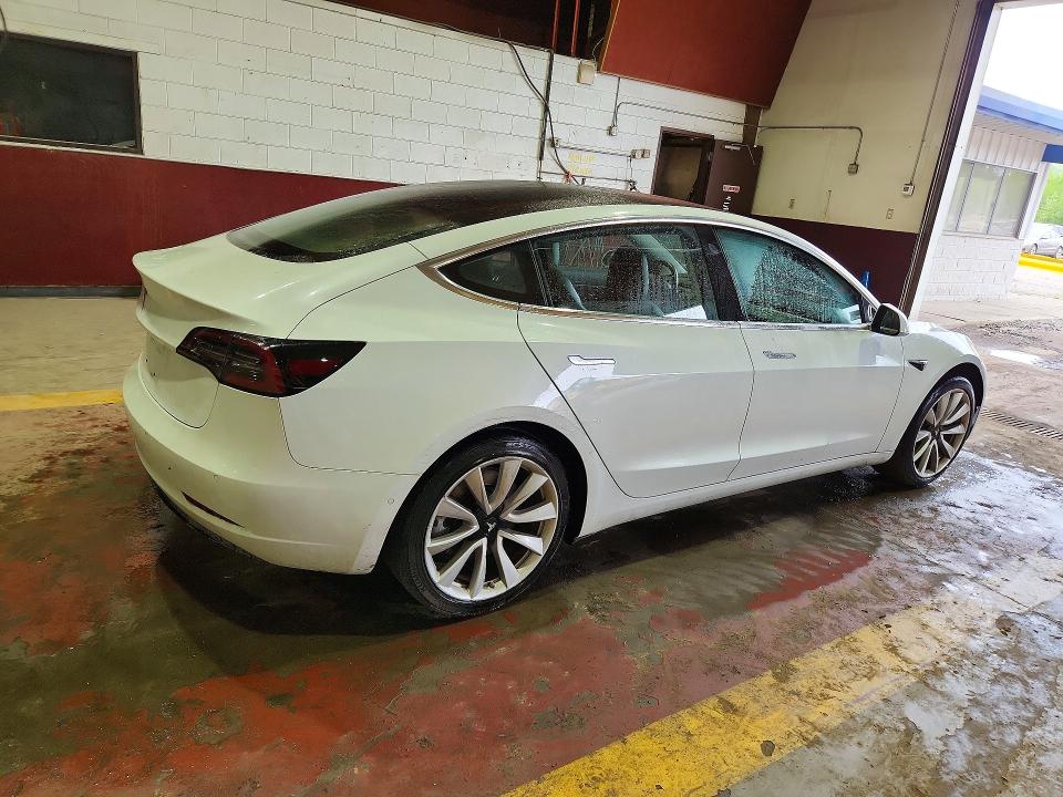 2018 Tesla Model 3 VIN 5YJ3E1EA1JF126506 COPART salvage auction — SIDE, Wv - Certificate Of Title, sold $6,500 on 2026-07-23 (photo 3)
