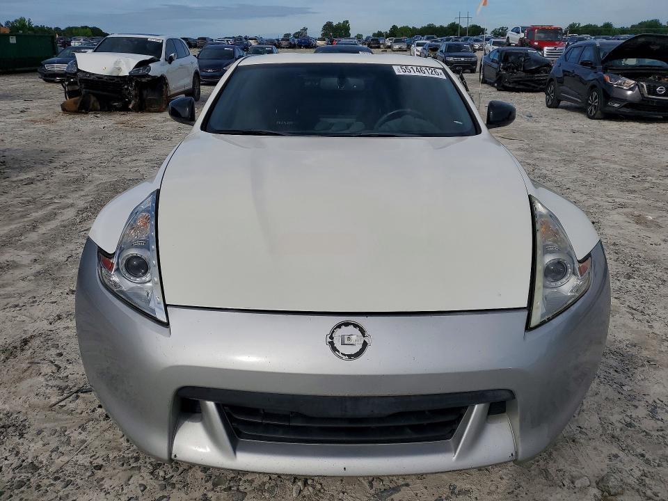 2018 Nissan 370z VIN JN1AZ4EH9JM570494 COPART salvage auction — MINOR DENT/SCRATCHES, Tx - Salvage Vehicle Title, sold $9,000 on 2026-07-29 (photo 5)