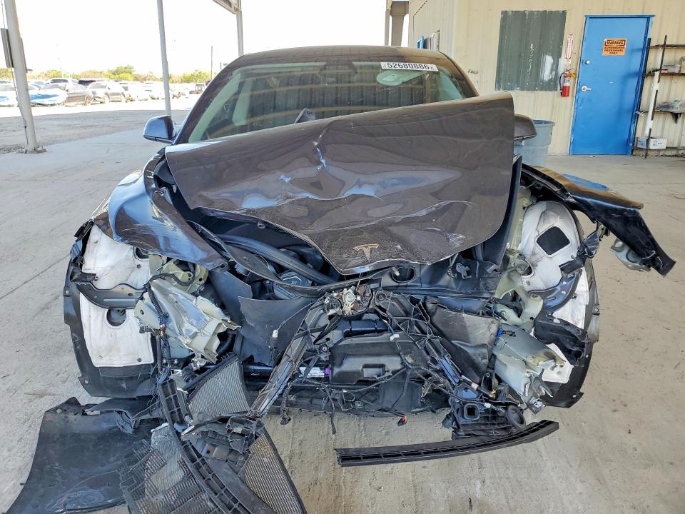 2025 Tesla Model 3 VIN 5YJ3E1EA4SF895034 COPART salvage auction — FRONT END, Fl - Cert Of Title Slvg Rebuildable, sold $7,400 on 2026-07-29 (photo 5)