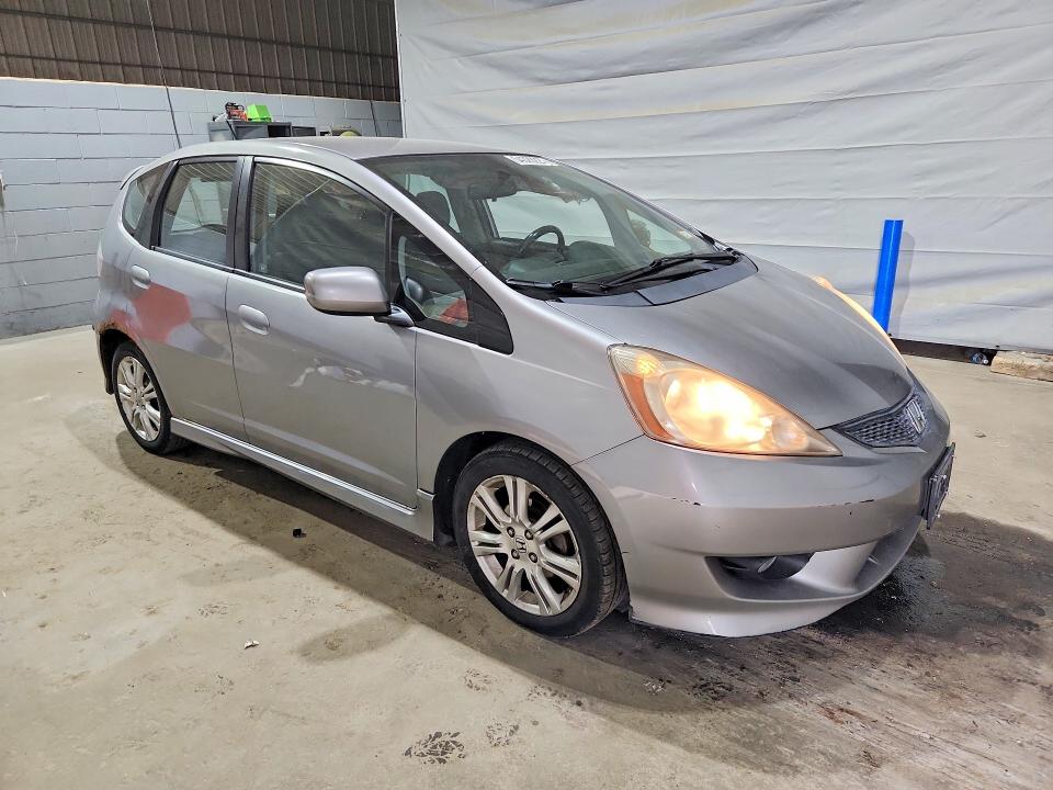 2009 Honda Fit VIN JHMGE88459S029435 COPART salvage auction — SIDE, Nh - Cert Of Title-Salvage, sold $100 on 2026-07-28 (photo 4)