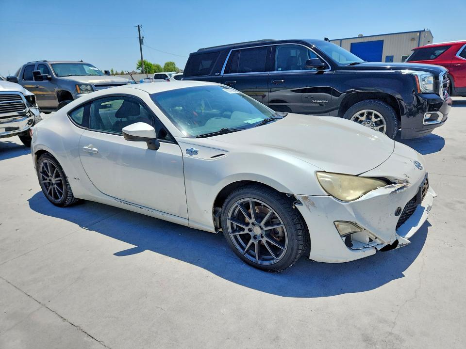 2013 Scion VIN JF1ZNAA13D2722164 COPART salvage auction — MECHANICAL, Tx - Salvage Vehicle Title, sold $575 on 2026-07-07 (photo 4)