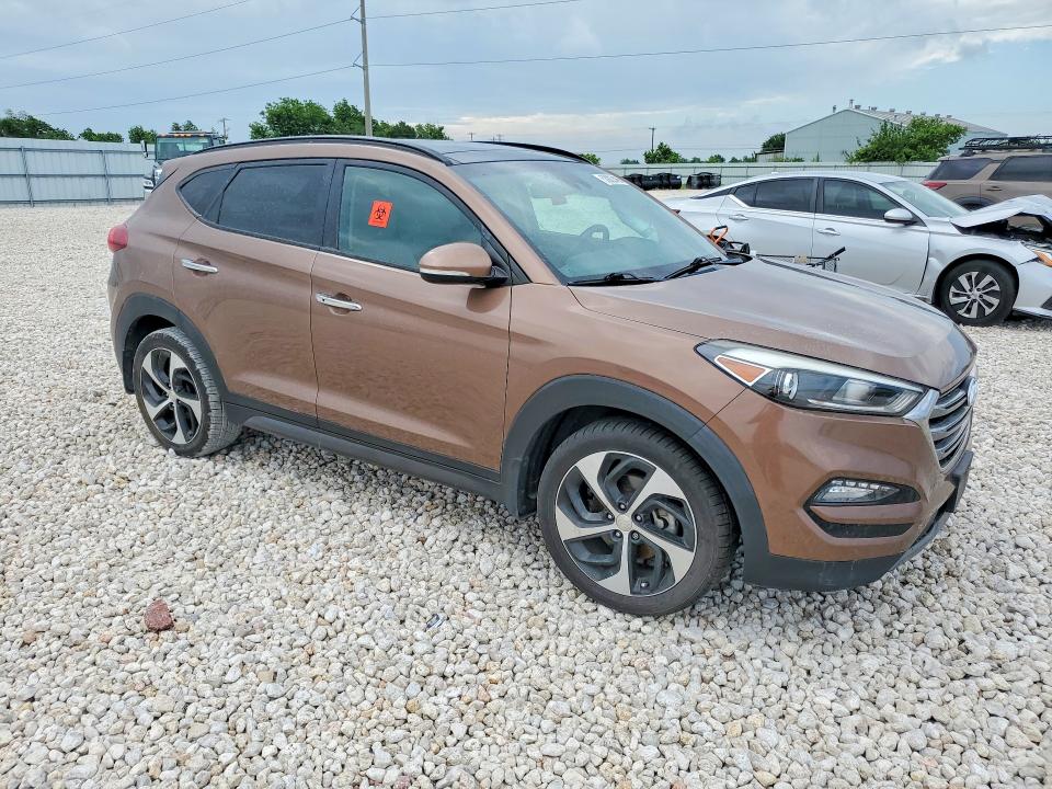 2016 Hyundai Tucson VIN KM8J33A25GU036357 COPART salvage auction — SIDE, Tx - Salvage Vehicle Title, sold $2,250 on 2026-07-02 (photo 4)