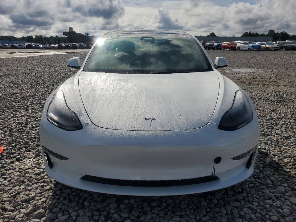 2023 Tesla Model 3 VIN 5YJ3E1EA4PF410737 COPART salvage auction — REAR END, Fl - Cert Of Title Slvg Rebuildable, sold $9,300 on 2026-07-13 (photo 5)